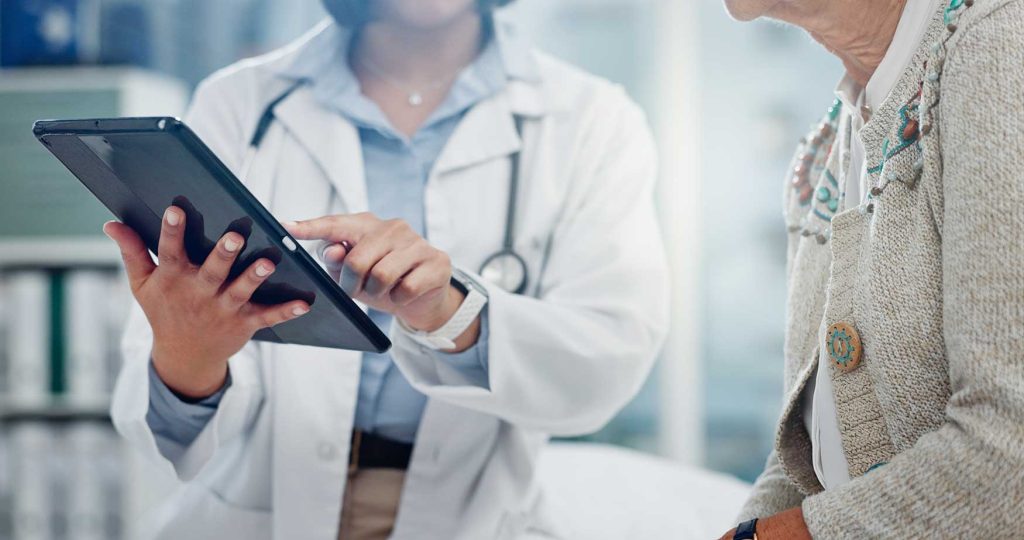 Patient consulting doctor